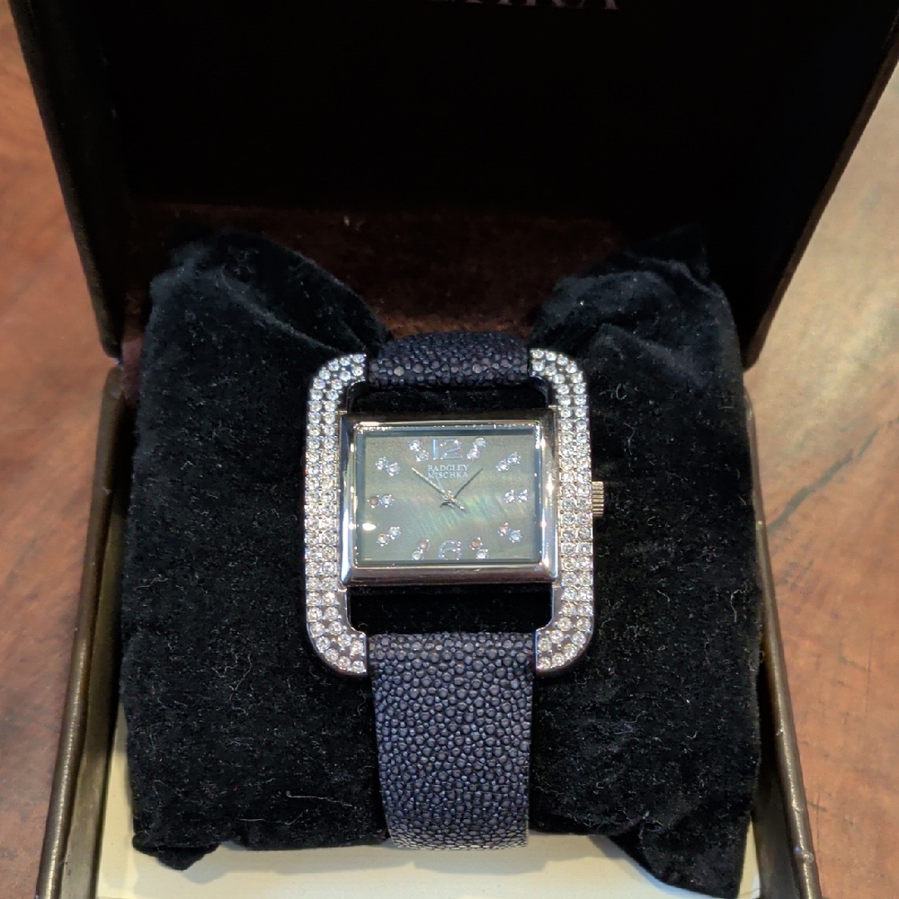 Elegant Black and Silver Watch with Crystal Accents